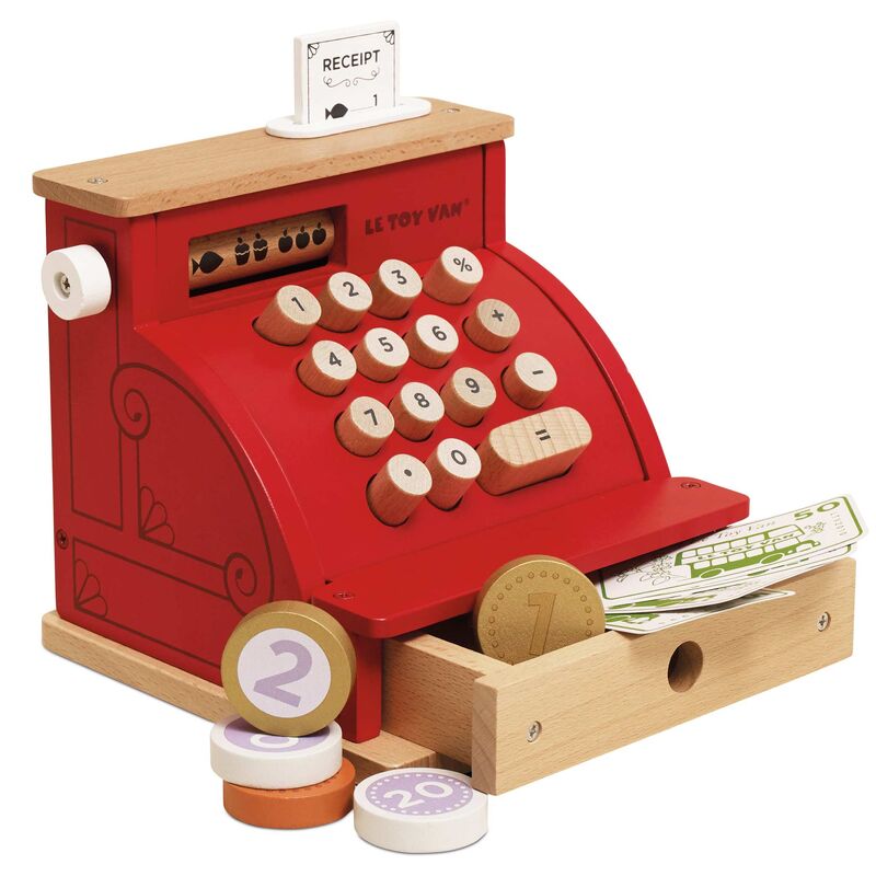 Toy cash register with wooden base and red top, featuring a drawer and coin stacker.