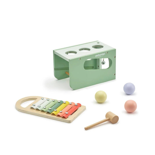 Children's musical toy set with xylophone, balls, and mallet on a white background