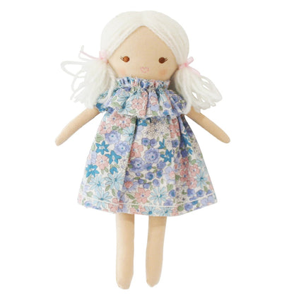 Doll with a floral dress on a white background