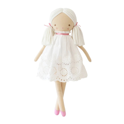 Doll with a white dress on a white background
