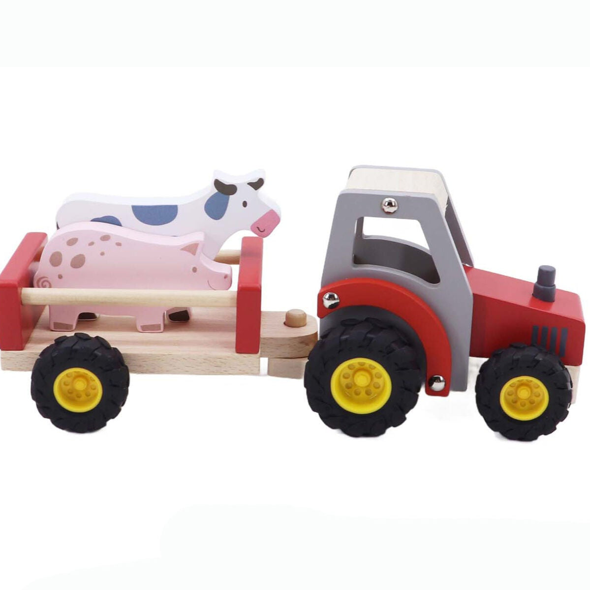 Wooden toy tractor with trailer carrying farm animals on a white background
