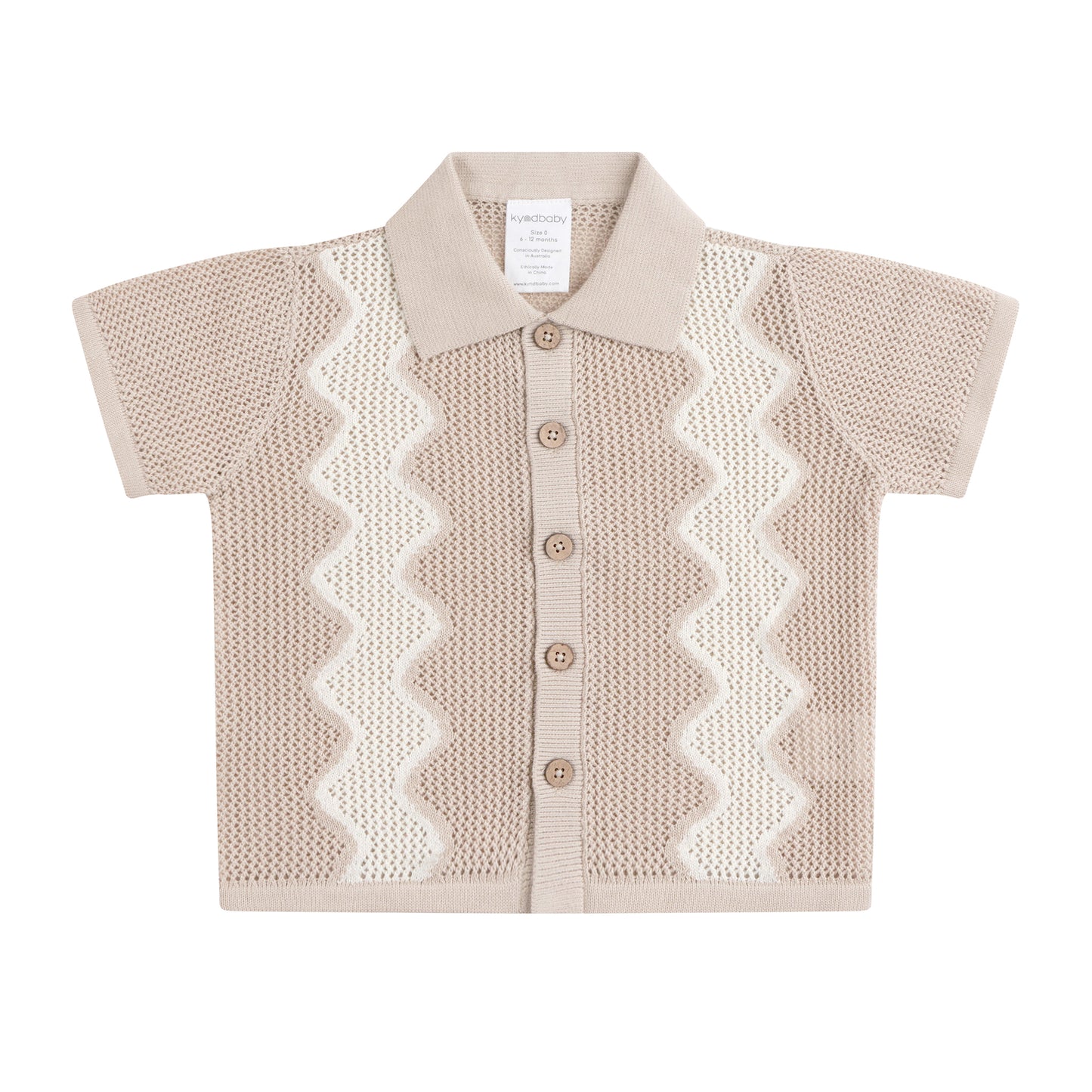 Beige knitted cardigan with white zigzag pattern on a white background