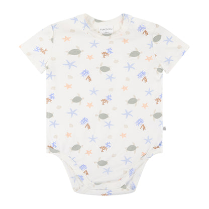 Baby onesie with starfish pattern on a white background
