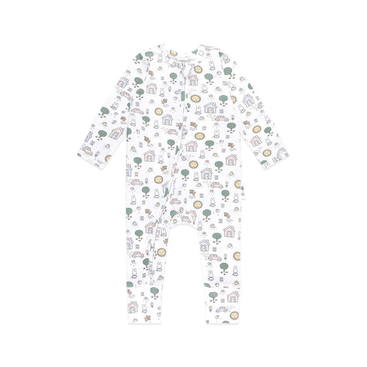 Children's onesie with a pattern of houses, trees, and animals on a white background
