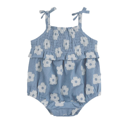 Blue baby romper with white floral pattern on a white background