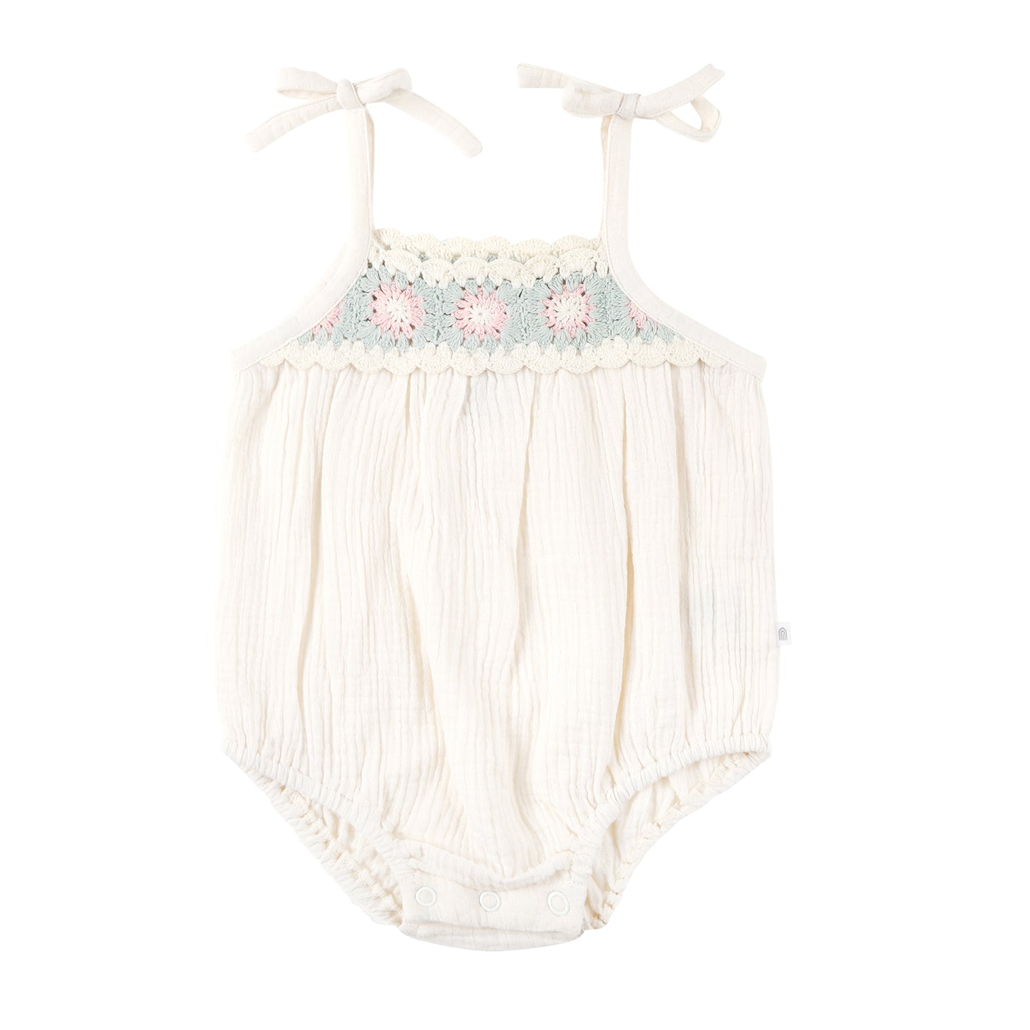 Baby romper with floral embroidery on a white background