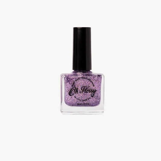 Purple nail polish bottle with glittery finish on a white background