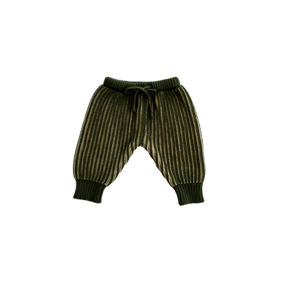 Green ribbed baby pants on a white background