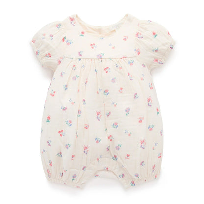 Baby romper with floral pattern on a white background