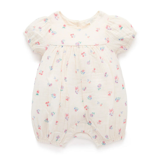 Baby romper with floral pattern on a white background