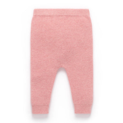 Pink baby pants on a white background