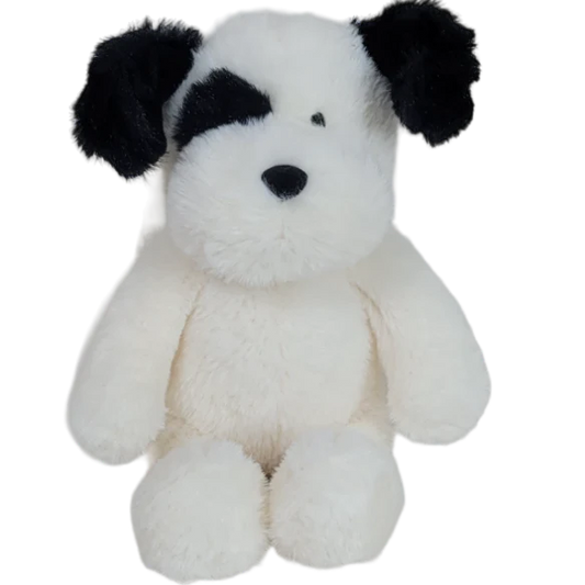 White plush dog toy with black ears on a white background