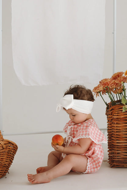 BLOSSOM AND PEAR DOROTHY FLUTTER SLEEVE ROMPER | PINK GINGHAM