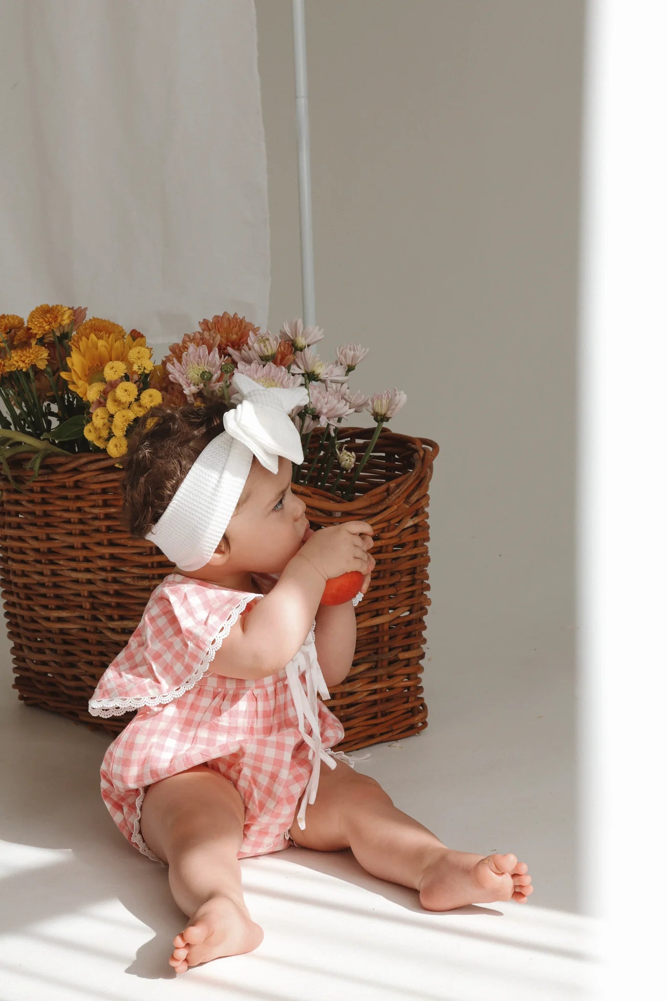 BLOSSOM AND PEAR DOROTHY FLUTTER SLEEVE ROMPER | PINK GINGHAM