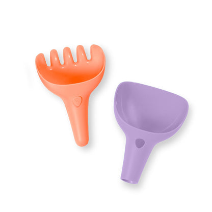 Orange and purple plastic tools on a white background