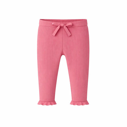 Pink ribbed pants with a bow on a white background