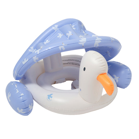 Inflatable baby float shaped like a duck with a blue shell on a white background