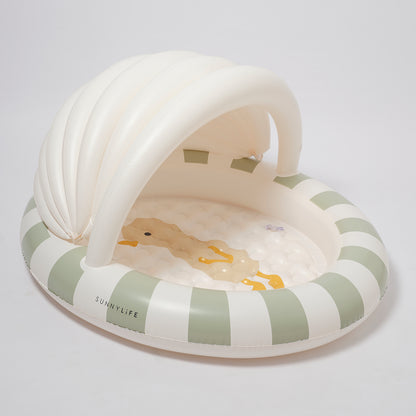 Inflatable swan pool float with duck design on a light gray background