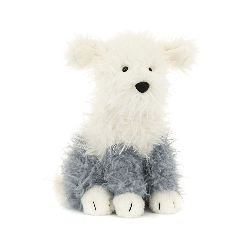 Plush toy polar bear with white fur and gray legs on a white background