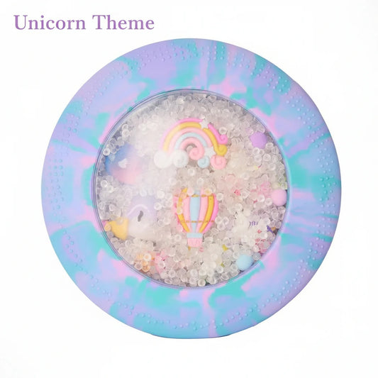 Decorative item with unicorn and rainbow theme on a pastel background