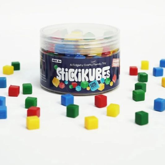 Jar of colorful 'Stickikubes' fidgety crafty family toy on a white background