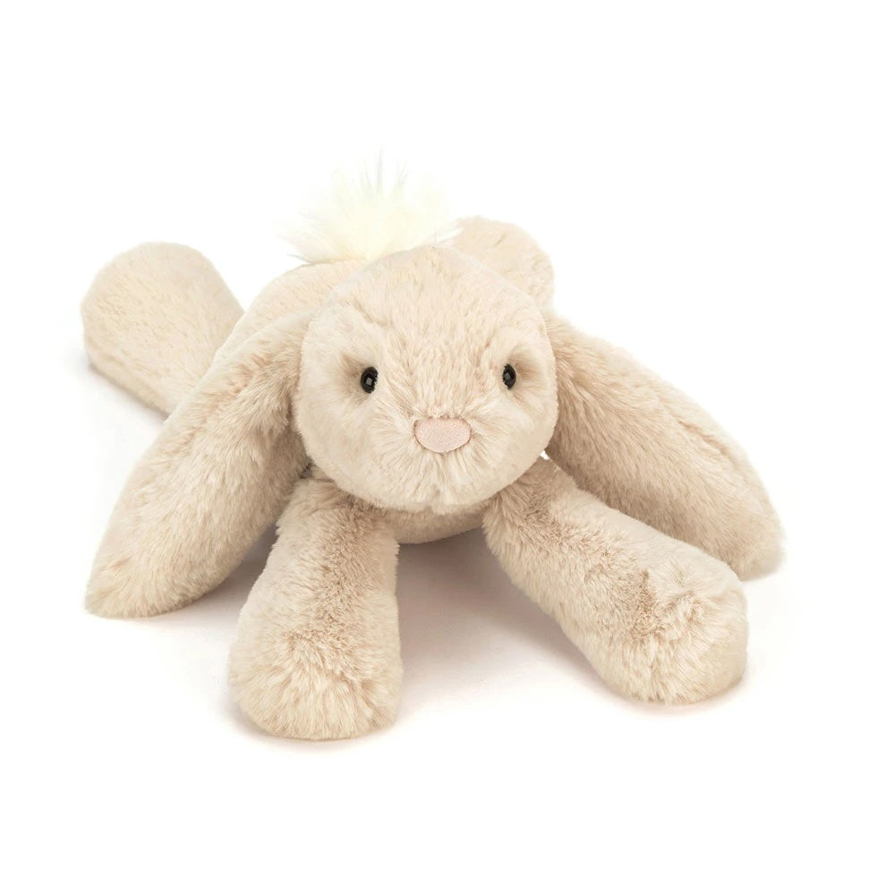Plush bunny toy on a white background