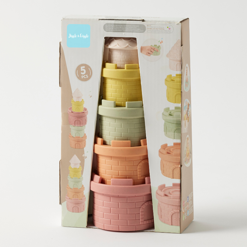 Stackable toy blocks in pastel colors with packaging on a white background
