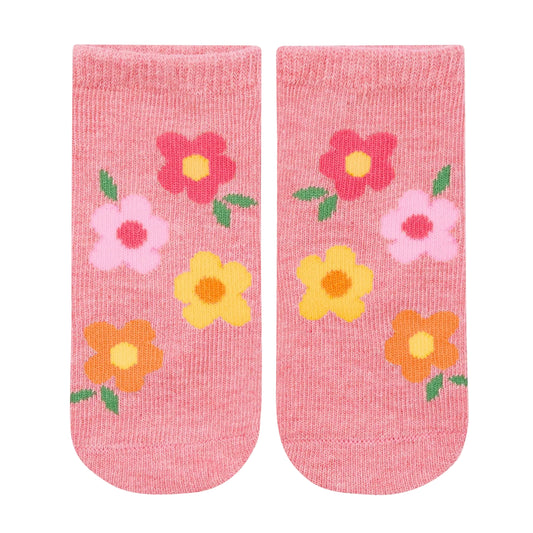 Pair of pink socks with floral designs on a light gray background