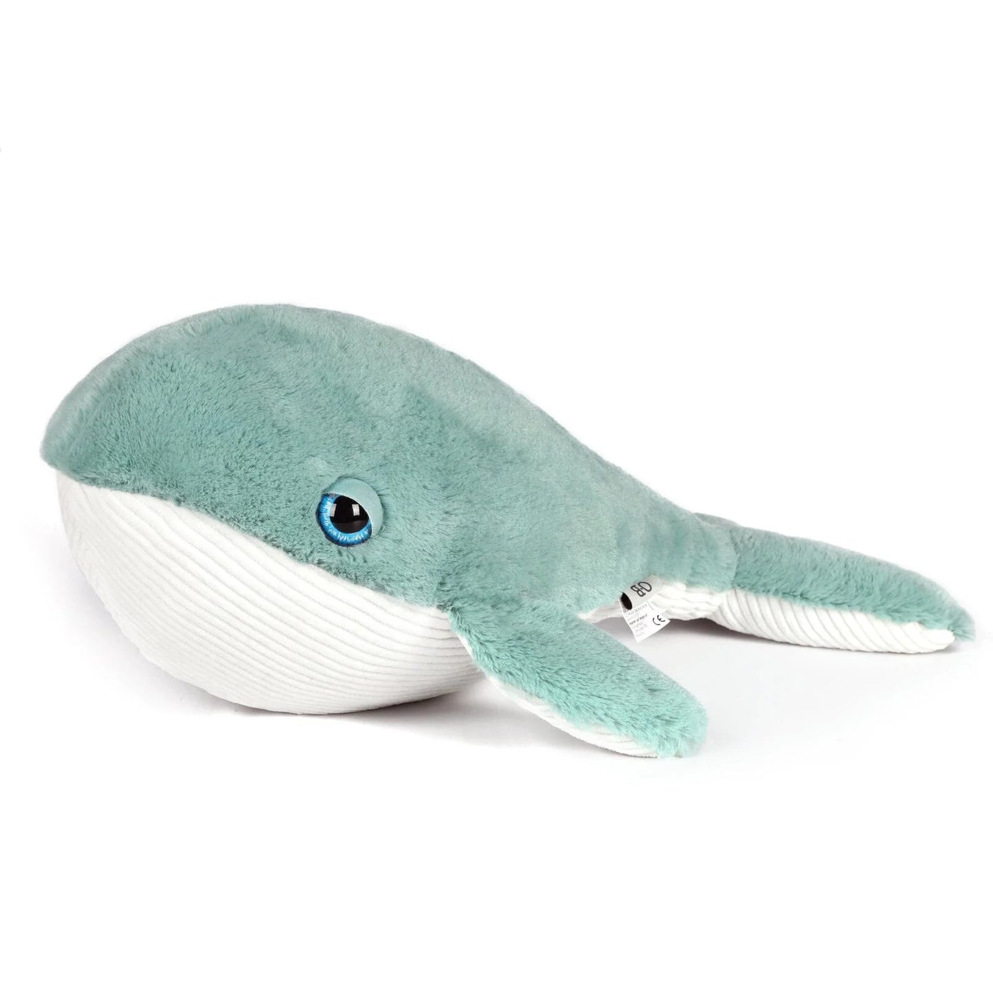 Plush whale toy on a white background