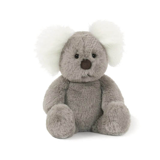 Plush teddy bear with a white pom-pom on a white background