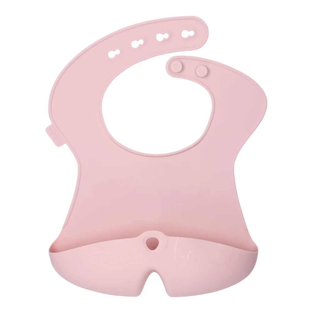 Pink silicone bib on a white background