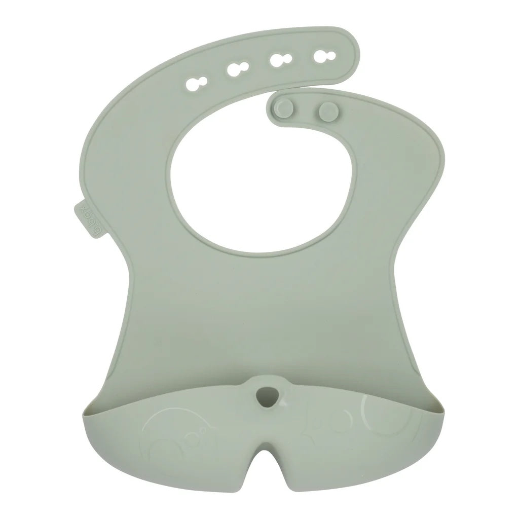 Light green silicone bib on a white background