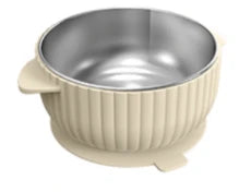 A cream-colored ribbed bowl with a stainless steel inner lining and small side handles, shown on a plain white background.