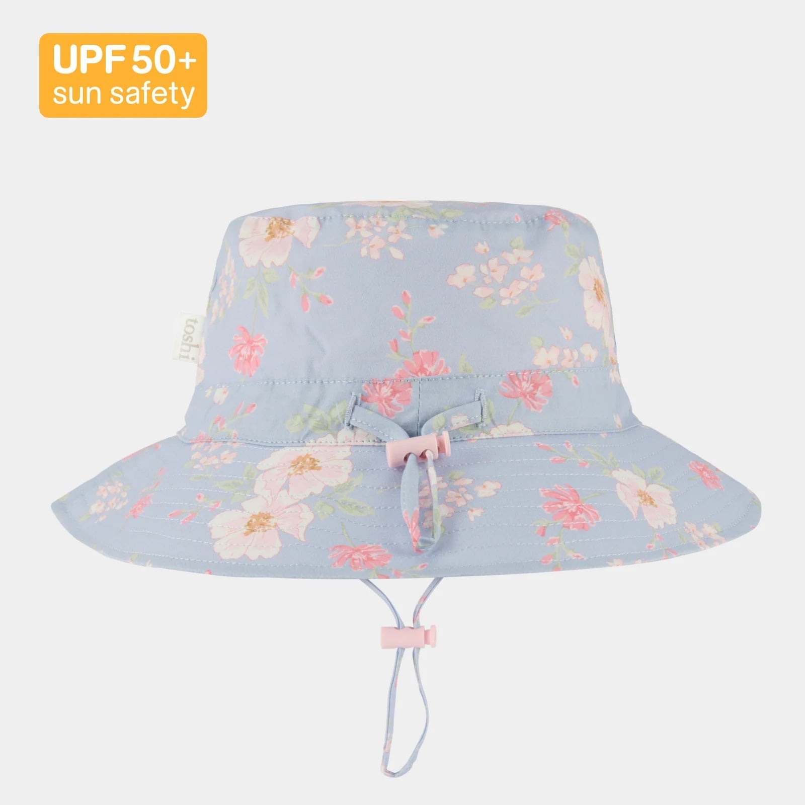 Floral-patterned sun hat with UPF 50+ label on a white background