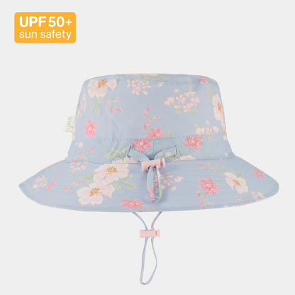 Floral-patterned sun hat with UPF 50+ label on a white background