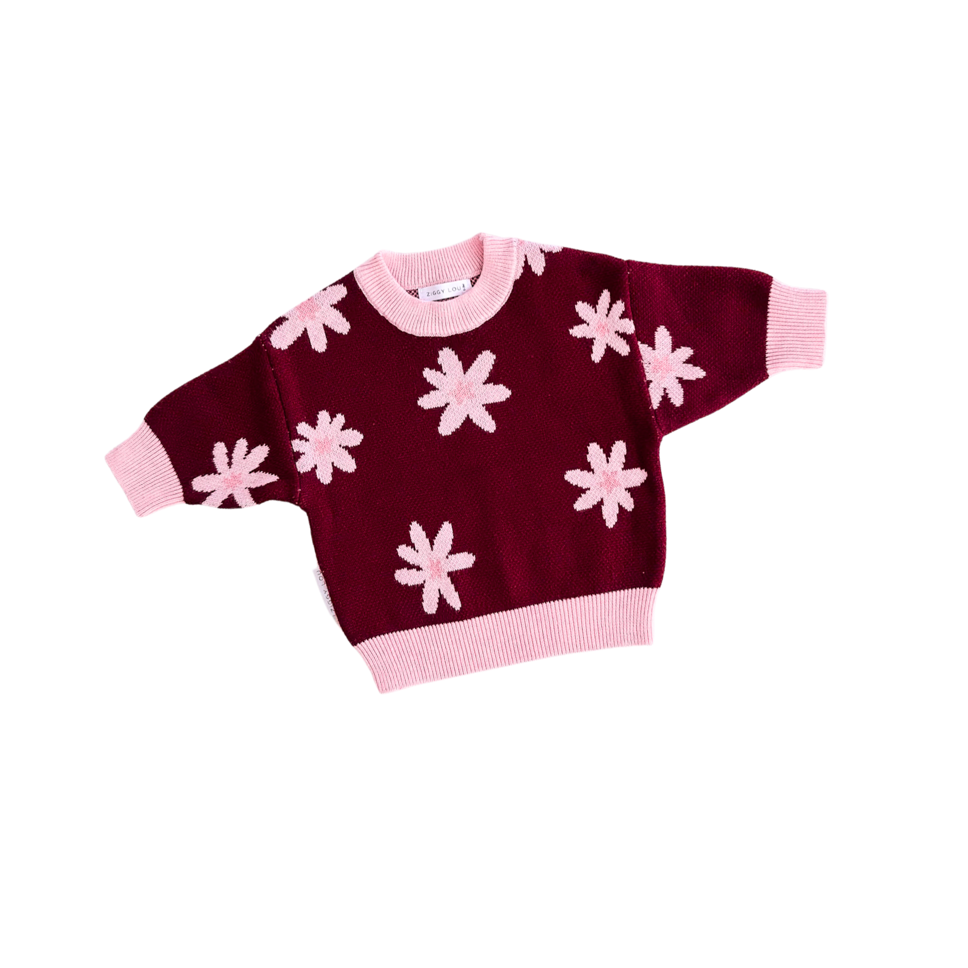 Maroon sweater with pink flower patterns on a white background