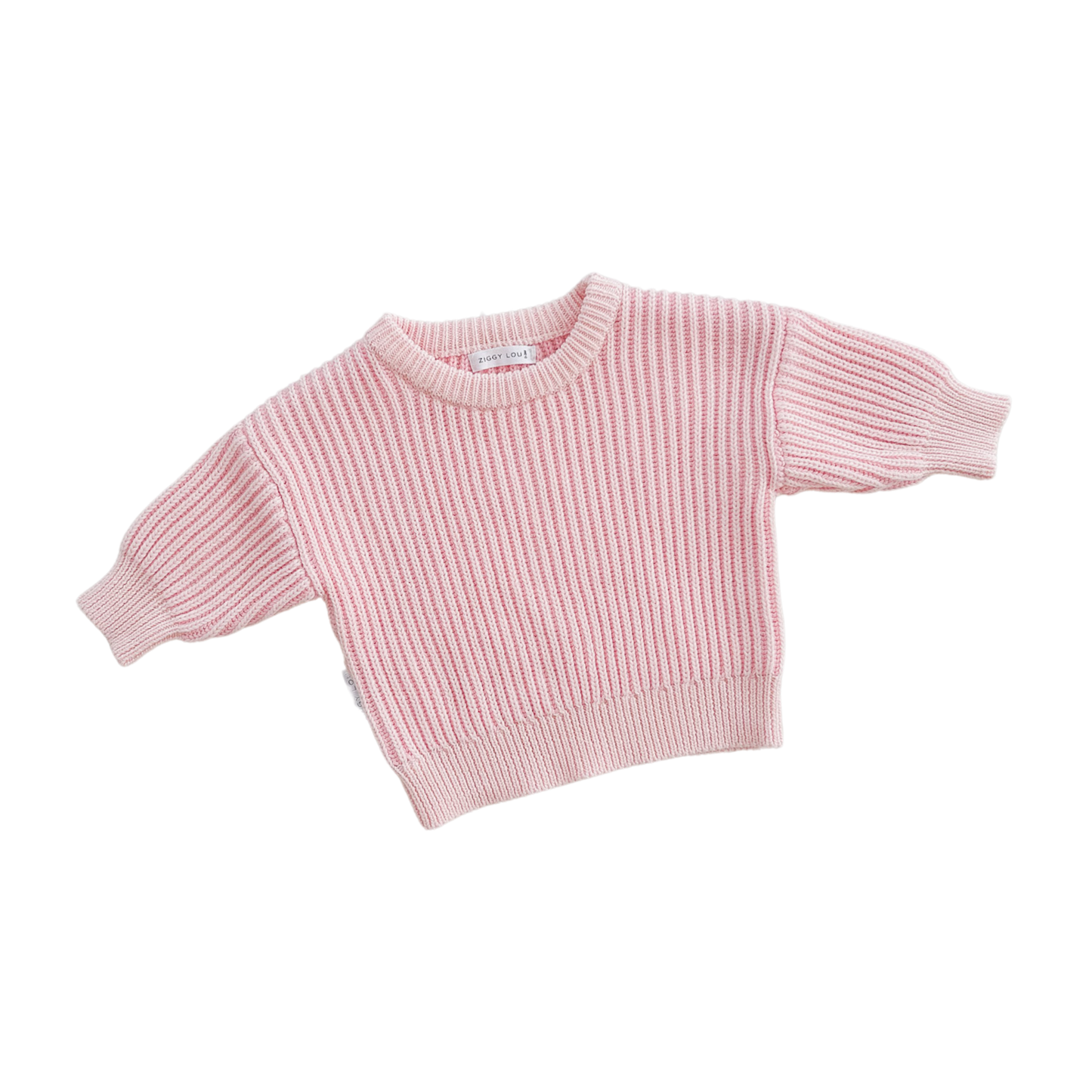 Pink ribbed sweater on a white background