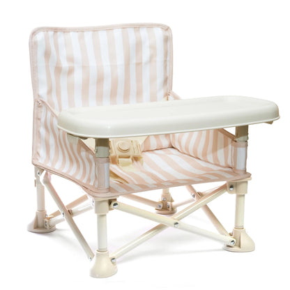 Foldable chair with striped cushion on a white background