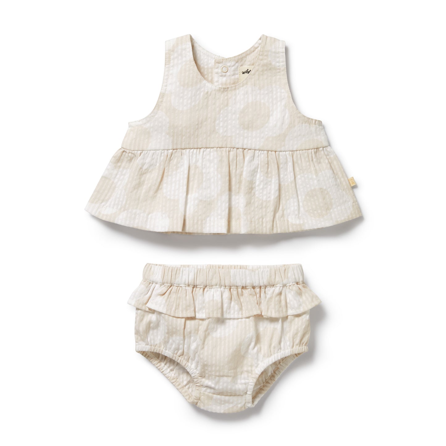Baby dress and bloomers set on a white background