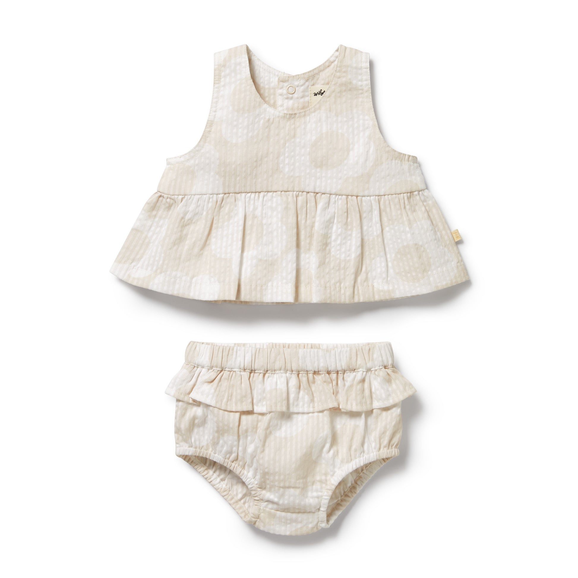 Baby dress and bloomers set on a white background