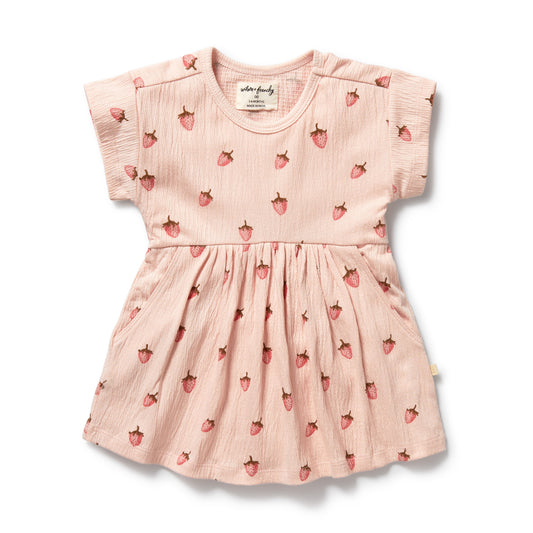 Pink dress with strawberry pattern on a white background