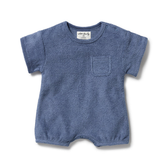 Blue baby romper with a pocket on a white background
