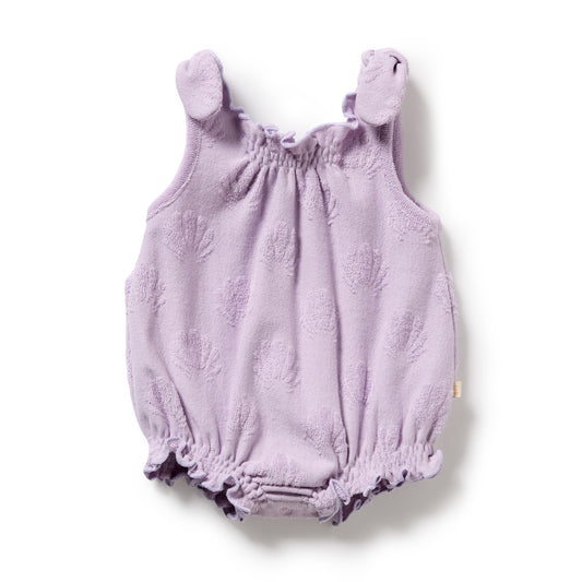 Purple baby romper with bear ears on a white background