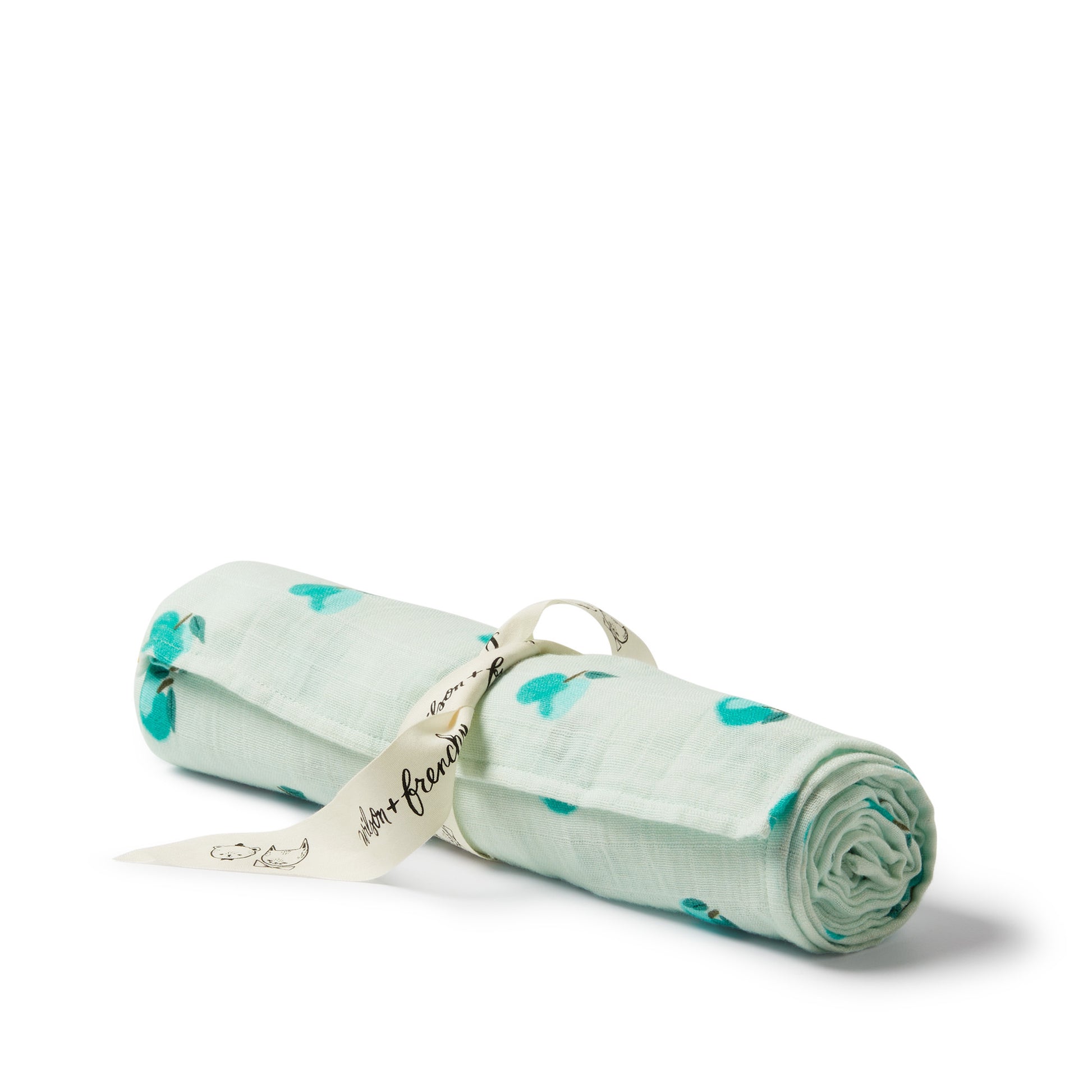 Rolled-up green fabric with blue patterns on a white background