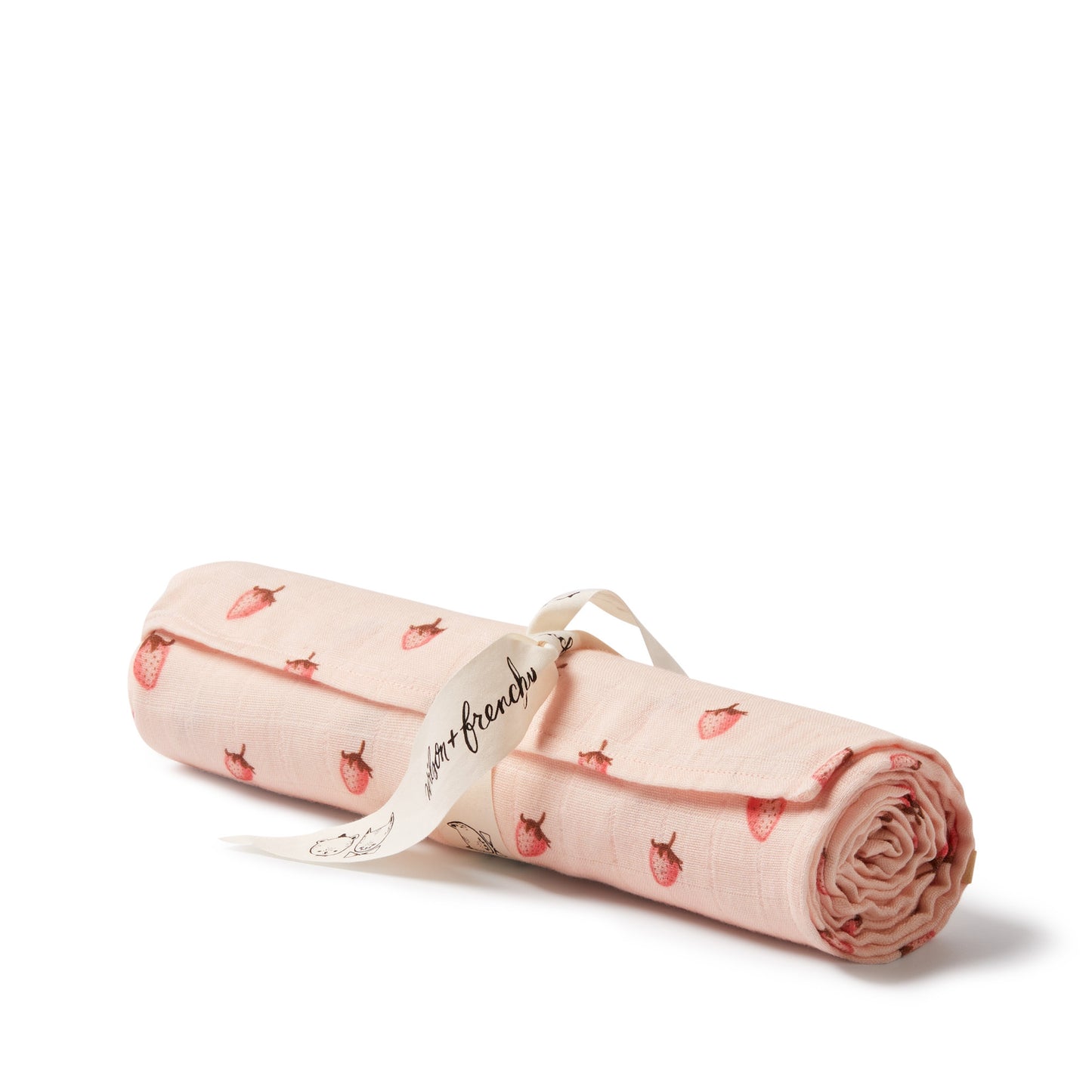 Rolled-up pink fabric with strawberry pattern on a white background