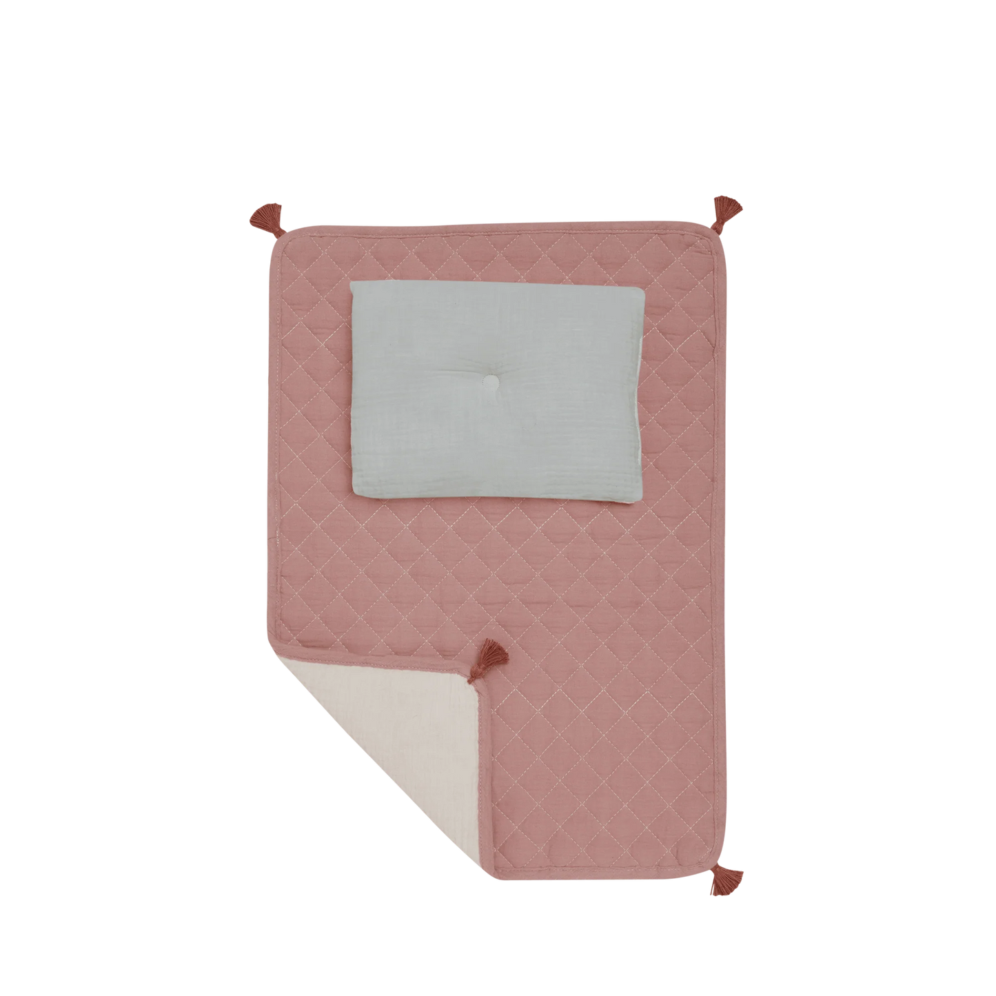 Pink quilted blanket with a gray square in the center on a white background