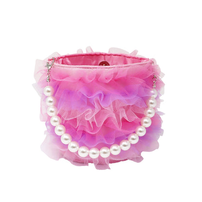 A pink ruffled tulle purse with a white faux-pearl beaded handle and silver-tone chain details, shown on a plain white background.