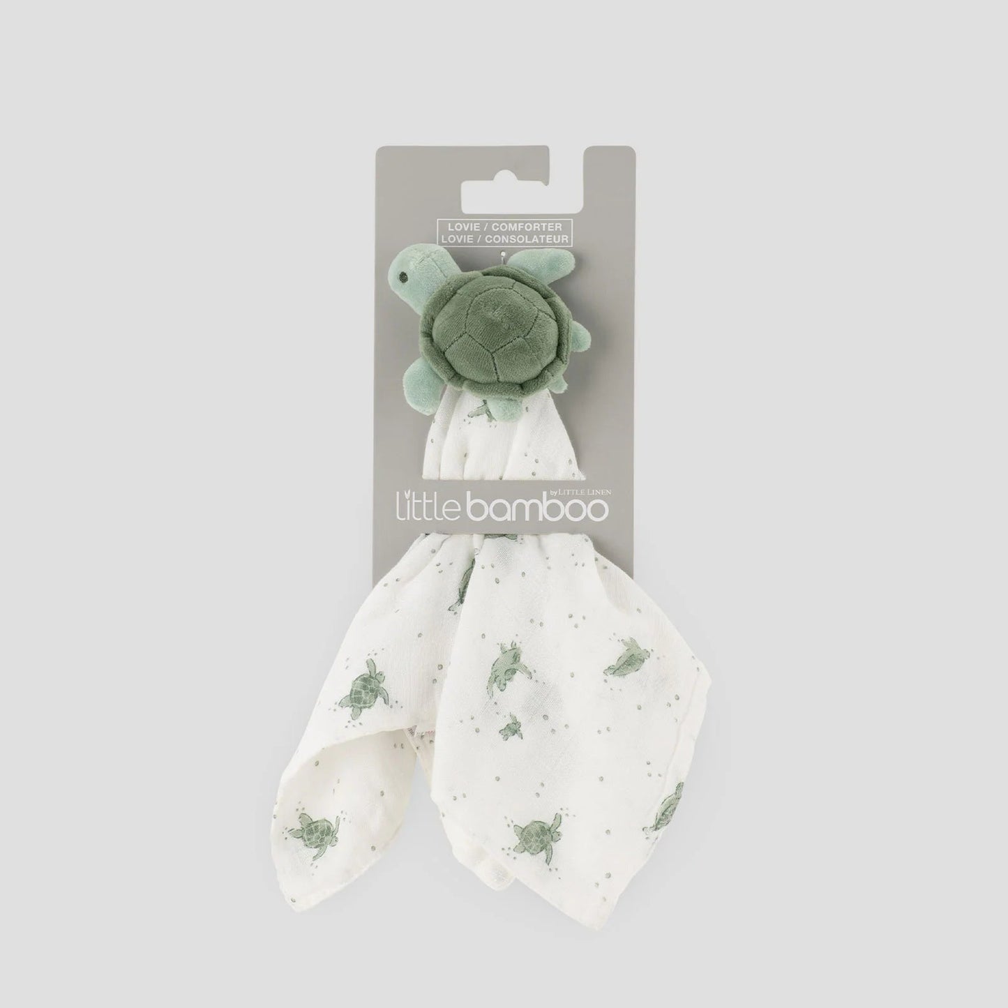 Turtle-shaped toy with a white blanket featuring green star patterns, branded 'little bamboo', on a gray background.