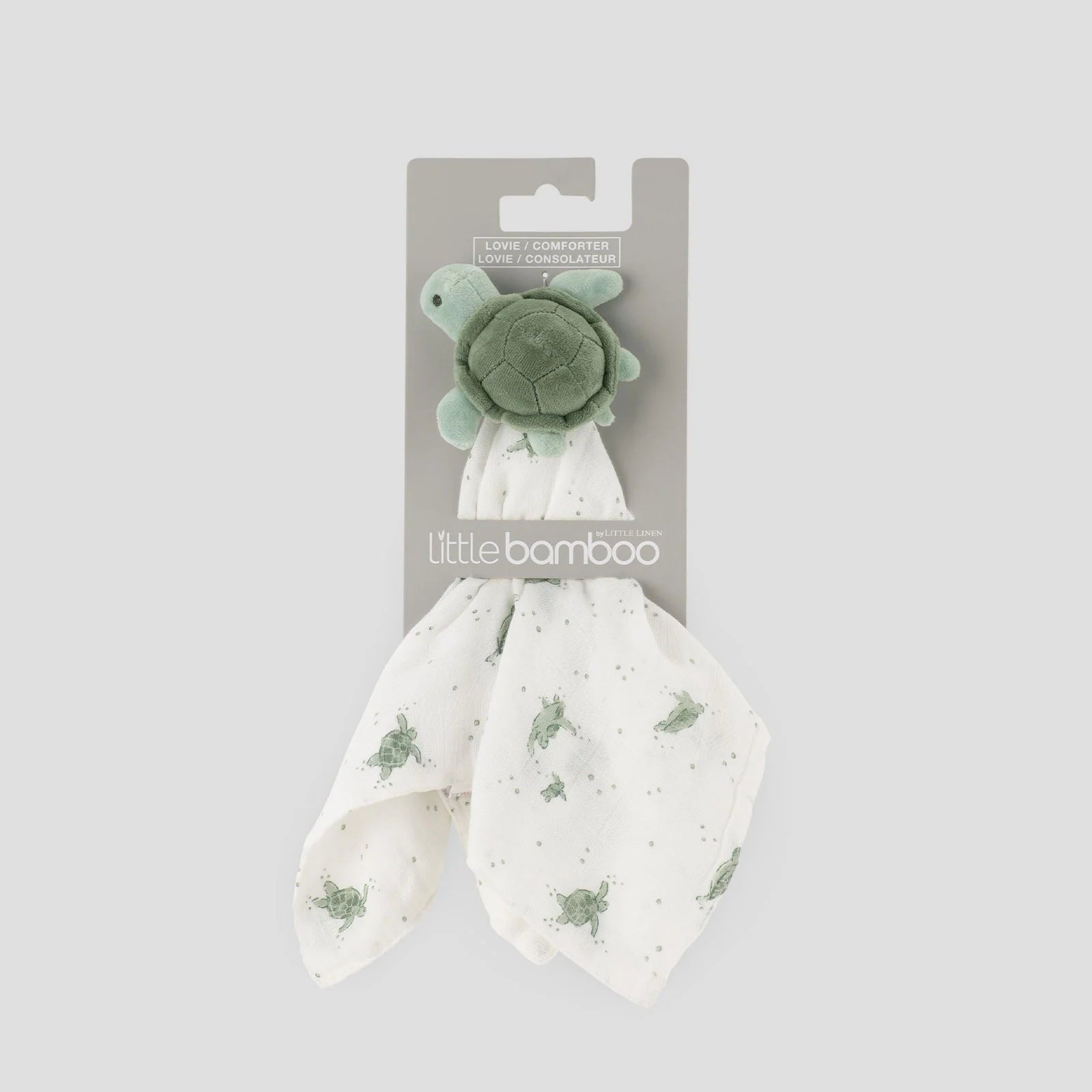 Turtle-shaped toy with a white blanket featuring green star patterns, branded 'little bamboo', on a gray background.