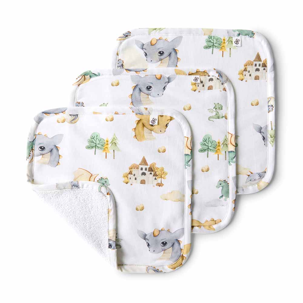 Set of baby bibs and burp cloths with animal print on a white background